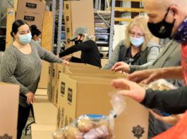 The Pokagon Band and Its Four Winds Casinos Donate 1,000 Easter Baskets to Those in Need Pokagon Band and its Four Winds Casinos Packing Easter Baskets 2 low res