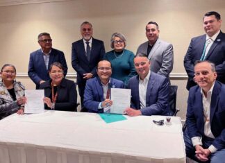 Navajo Nation Plans Gaming Facility on Newly Acquired Trust Land Navajo Horseman Lodge trust signing